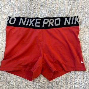 Nike Pro Red Performance Shorts with Black Waistband